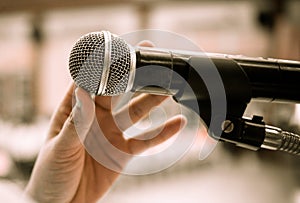 Seminar Conference Concept : hands businesspeople holding microphones for speech or speaking  in seminar room, talking for lecture