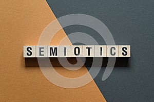 Semiotics - word concept on cubes photo