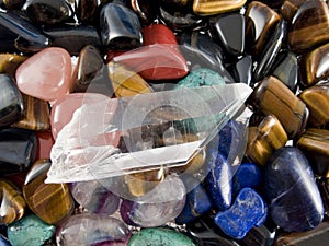 Semiprecious gemstones and quartz crystal photo