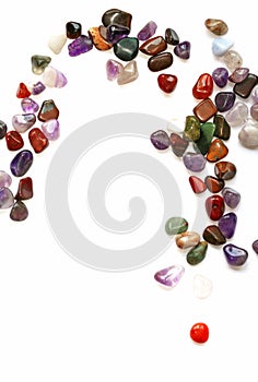 Semiprecious stones on white background photo