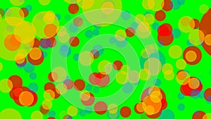 Semitransparent variegated circles flying on green screen. Multicolored particles moving uneven on background.