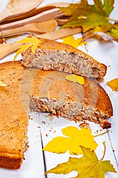 Semolina cake or manna pie with walnuts and raisins on wooden rustic table