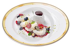 Semolina gnocchi with raspberries, blueberries and berry jam