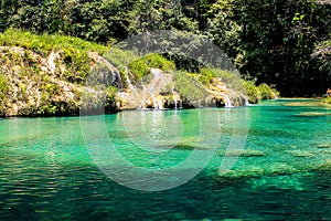 Semuc champey natural pool and .its turquoise waters from riverside