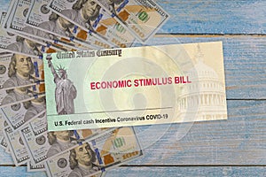 Senate stimulus deal includes individual checks virus economic stimulus plan US 100 dollar bills currency on global pandemic Covid