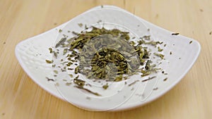 Sencha green tea dry leaves. Traditional japanese drink ingredient