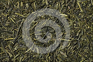 Sencha Superior dried tea leaves close up full frame