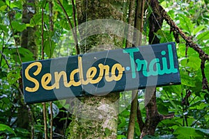 Sendero trail sign nailed to a tree in Boquete Panama photo
