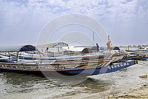 Fishing boat at Sine- Saloum Delta SENEGAL, AFRICA photo