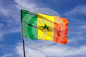 Senegal flag waving in the wind against sky