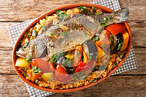 Senegalese Thieboudienne it is a preparation of fresh fish, and rice, cooked with vegetables such as cassava, pumpkin, cabbage,