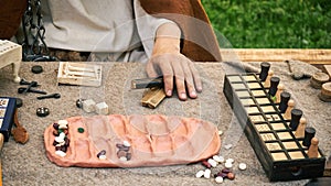 Senet and kalah game, popular in ancient Roman. Reconstruction of board games from the Roman Empire