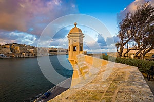 Senglea, Malta - Watch tower of Fort Saint Michael, Gardjola Gardens with the city of Valletta