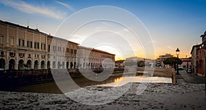 Senigallia, the Misa river crosses the historical center of the city at sunset. Marche, Italy photo