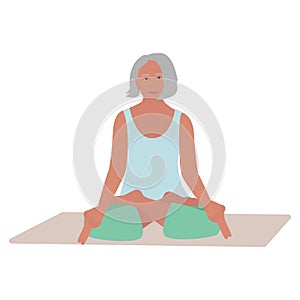 Senior active woman doing yoga Lotus pose