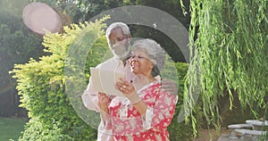 A senior African American couple spending time together in the garden
