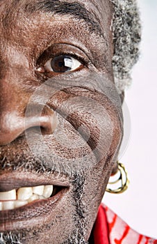 Senior African American man with earrings