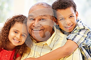 Senior African American man and grandchildren