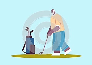 senior african american man playing golf aged player taking a shot active old age concept horizontal