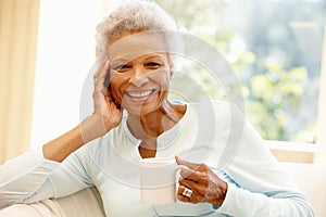 Senior African American woman at home