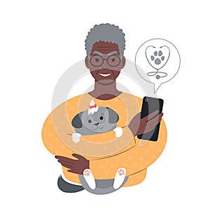 senior african man with a tiny dog searching for veterinarian online from smartphone.