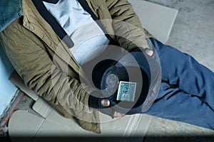 Senior-aged asking for money photo