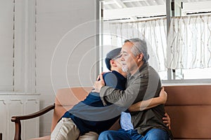 Senior asian father give advice adult son in living room, Happiness family concepts