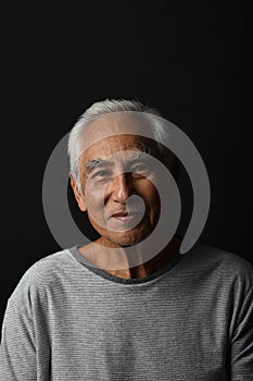 Senior asian old man, Confident and smiling elderly people on black background.