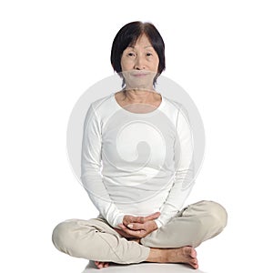 Senior asian woman doing meditation in buddhism practice