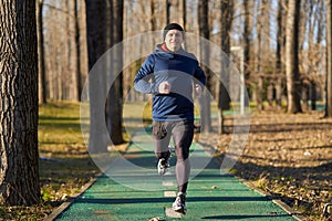 Senior athlete running in the park