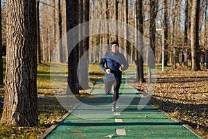 Senior athlete running in the park