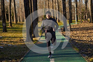 Senior athlete running in the park