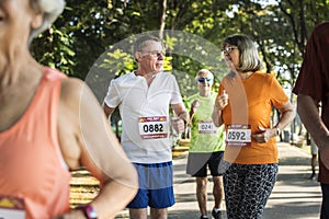 Senior athletes running at the park