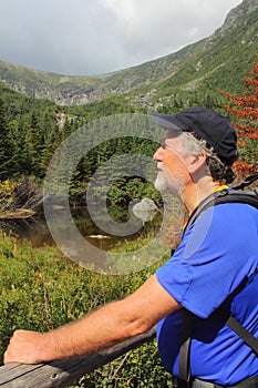 Senior backpacker in the White Mountains of New Hampshire.