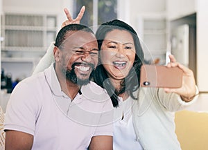 Senior black couple, selfie or happy in home together for silly, social media or relax with peace sign hand. Mature man