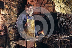 Senior blacksmith forge iron