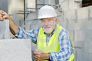 senior builder at work