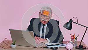 Senior business man analysing paperwork documents loses, bad fortune, loss, deadline problem trouble