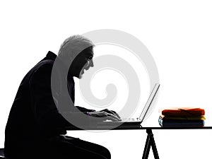 Senior business man computing happy silhouette