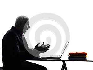 Senior business man computing surprised silhouette
