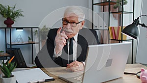 Senior business man director having interview job discussion, video conference call at home office