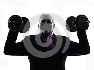 Senior business man holding weights silhouette