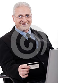 Senior business man making online purchase