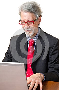 Senior business man with pc