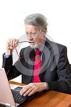 Senior business man with pc