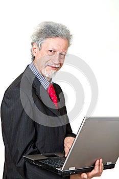 Senior business man with pc