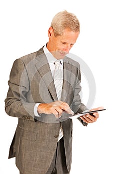 Senior business man with tablet