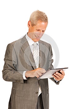 Senior business man with tablet