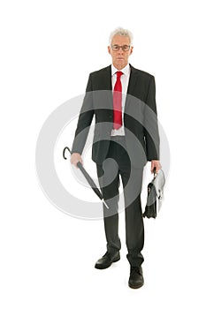 Senior business man with umbrella