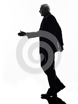 Senior business man walking handshake silhouette